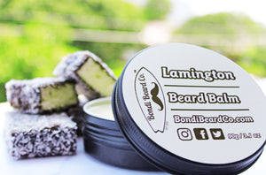 Image of Bondi Beard Co. Lamington Beard Balm in 90g container with lamingtons in background.