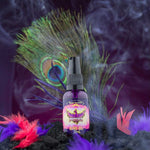 Load image into Gallery viewer, Image of black atomising bottle with colourful Bondi Beard Co. label with bright peacock feathers in background
