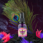 Load image into Gallery viewer, Another image of black atomising bottle with colourful Bondi Beard Co. label with bright peacock feathers in background

