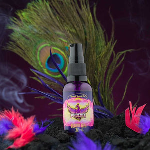 Another image of black atomising bottle with colourful Bondi Beard Co. label with bright peacock feathers in background
